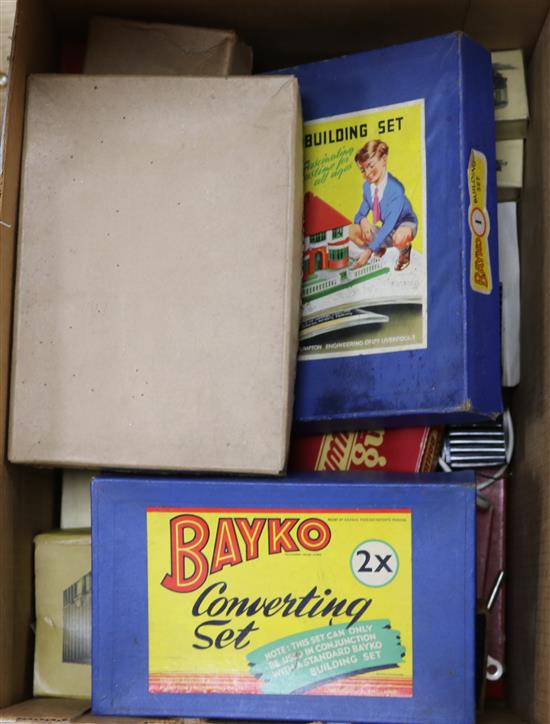 A box of toys including Meccano Triang train set and Bako building sets